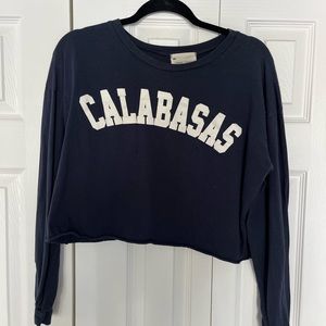 Cropped long sleeve top